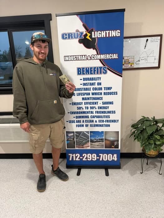 Cruz Electric crew member performing electrical work